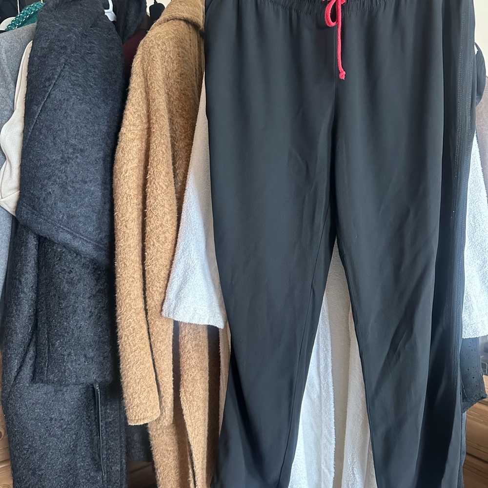 Celine Black Trousers with Bold Red Accent